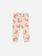 Load image into Gallery viewer, Leggings with red pattern on a white background
