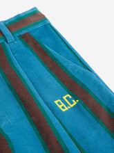 Load image into Gallery viewer, Blue and brown striped towel with &#39;B.C.&#39; logo on a white background