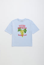 Load image into Gallery viewer, Light blue t-shirt with colorful graphics and text on a white background