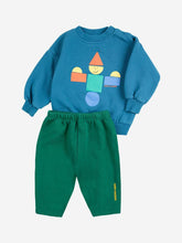 Load image into Gallery viewer, Children&#39;s blue sweatshirt with colorful graphic and green pants on a white background